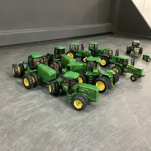 BAG OF SMALL CAST JD TRACTORS,