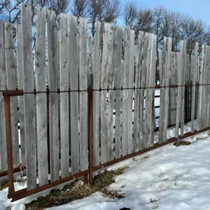 30’ free standing windbreak panel w/ boards (some boards missing)