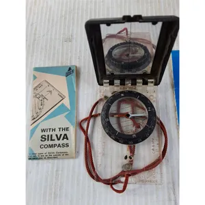 2 Silva Compasses and a Headlamp