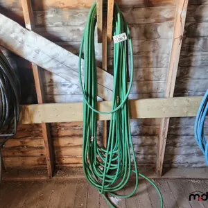 (2) Green Water Hose
 UNRESERVED