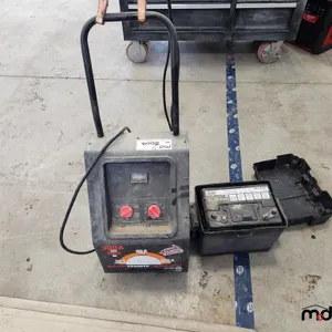 Battery Charger and Battery 
 UNRESERVED