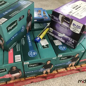 (8) Boxes of Depends (Various Sizes/Styles), Box of Feminine Pads, (2) Guinness Books and Wiper Blades
 UNRESERVED