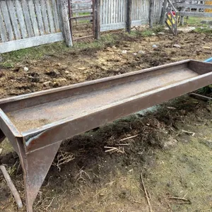 2 - 10' BROWN STEEL FEED TROUGHS
