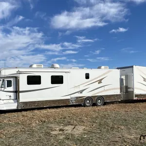 2007 Freightliner Haulmark T/A Motorhome and Tridem Stacker Trailer