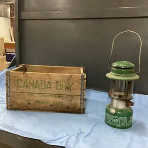 VINTAGE CANADA DRY CRATE,  COLEMAN LANTERN, VERY RUSTY BARN LANTERN AND PAINTED WOOD DECOR CRATE