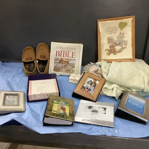 BOX W/ BABY BLANKETS, FRAMES,  BIBLES, MOCCASIN SLIPPERS