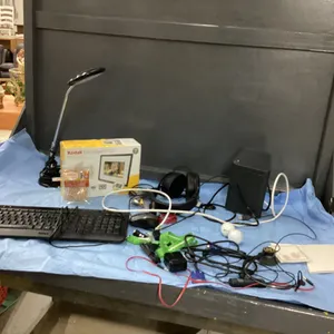 BOX W/ DIGITAL FRAME, DESK LAMP, KEYBOARD, MOUSE, COMPUTER. SPEAKER, HEADPHONES ETC