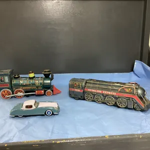 (2) VINTAGE METAL LOCOMOTIVES - BATTERY OPERATED & DIE CAST CAR
