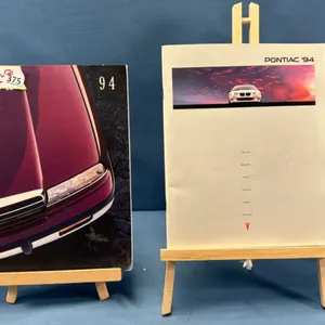 2 Car Brochures for 1994 Buicks and Pontiacs