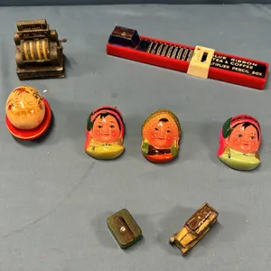 8 Pencil Sharpeners and Blue Ribbon Plastic Pencil Case