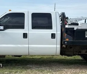 2015 Ford F350 Super Duty Crew Cab flatbed pickup truck
