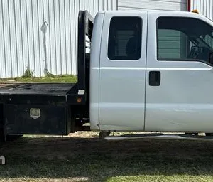 2015 Ford F350 Super Duty SuperCab flatbed pickup truck
