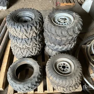 Quantity of (11) 25x10.00-12 Tires