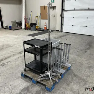 (2) Rolling Carts, (2) IV Poles and Table Legs
 UNRESERVED