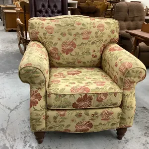 ARM CHAIR W/ WOOD LEGS AND FLORAL DESIGN