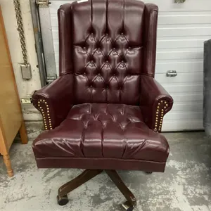 DEEP BURGUNDY LEATHER ROLLING OFFICE CHAIR - SWIVELS AND CAN ROCK