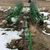 JD 704 12-wheel V-Rake