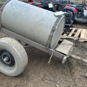 Approx 100 gal tank on 2 wheel wagon, F82