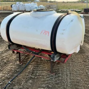 300 gal poly tank on stand, F189