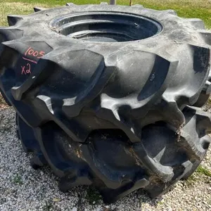 Used 18.4-26 imp tire on black 8 bolt rim