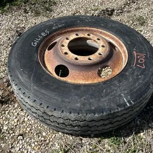 Used 11R24.5 truck tire on rim