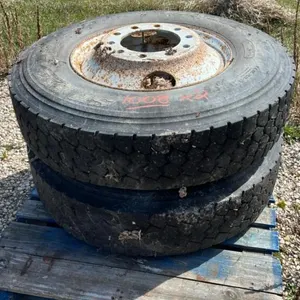 Used 11R22.5 truck tire on rim