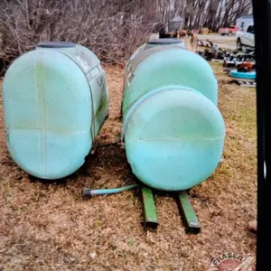 approx 200-gal Poly Liquid Saddle Tanks