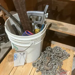 Lots of screwdrivers, 7pc nut driver set, hack saw, (2) squares, trouble light, hammers, level, 20' of 3/8" chain
