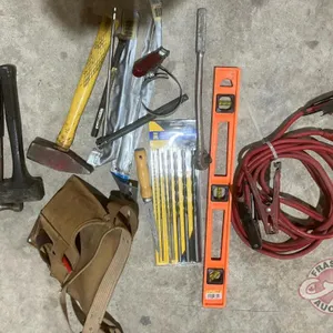 Level, nail pouch w/ measuring tapes, hammers, booster cables, 7pc drill bit set, propane tank w/ (2) torches