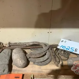 Beam scale, horse shoes, (2) stone heads