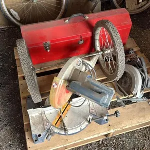 Pallet w/ Ryobi mitre chop saw, hand planer, skill saw, red metal toolbox (empty)