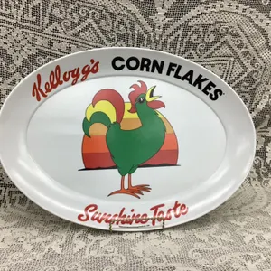 VINTAGE PLASTIC KELLOGG'S CORNFLAKES PLATTER ON STAND