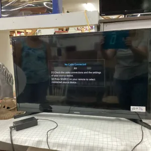 SAMSUNG 31" FLAT SCREEN TV W/ REMOTE ON STAND