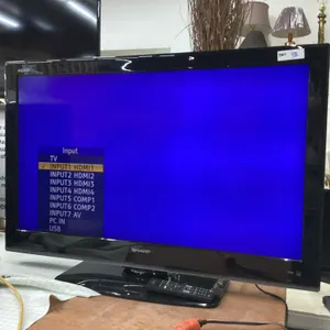 SHARP AQUOS 42" FLAT SCREEN TV W/ REMOTE ON STAND