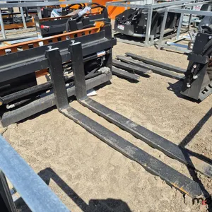 2025 Wolverine PFA-113300G Skid Steer Pallet Fork Hydraulic Adjustable Attachment
 UNRESERVED