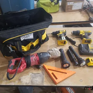 DeWalt Bag w/ (2) Drills, Sawzall, Charger, Battery and Flashlights
 UNRESERVED