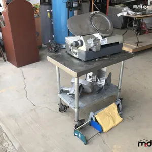 Hobart 12" Automatic Meat Slicer 2912 w/ Nemco Attachments, Butcher Paper Rollers, Machine Lubricant and Training Video Tape

 UNRESERVED