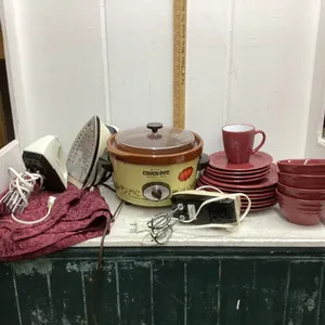 (2) BOXES W/ HOUSEHOLD ITEMS - DISH SET, IRON, TABLECLOTH, CROCKPOT, HAND MIXER