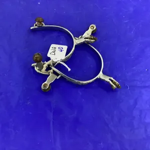 LADIES SPURS. SILVER COLOR. FLORAL DESIGN