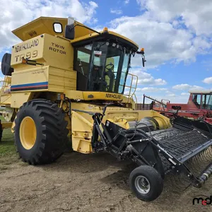 2002 New Holland TR99 Combine & Pickup Header
 UNRESERVED