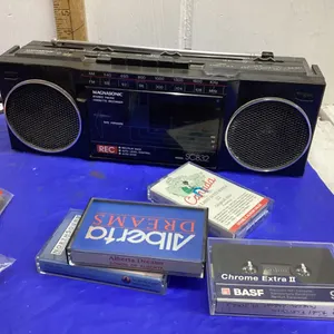 CASSETTE TAPES + PLAYER
