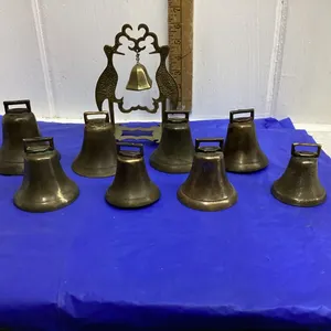 8 BRASS BELLS AND ONE DECORATIVE BELL