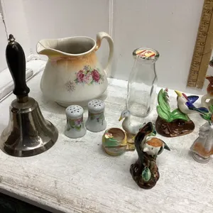 BOX W/SCHOOL BELL, JUG AND MISC KNICKKNACKS