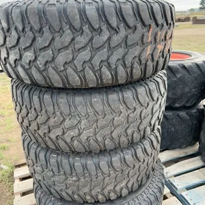 Set of four truck tires on Chevy rims