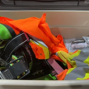 Container with lanyard and safety equipment