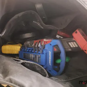 Bag of Milwaukee Battery, Grinder and Misc. Tools
 UNRESERVED