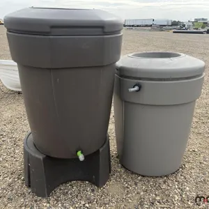 (2) Assorted Rain Barrels and a Stand
 UNRESERVED