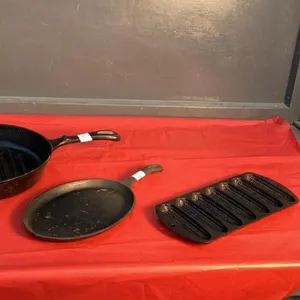 (3) CAST IRON PANS - CORN BREAD PAN, SMALL OVAL FRYPAN, ROUND PAN