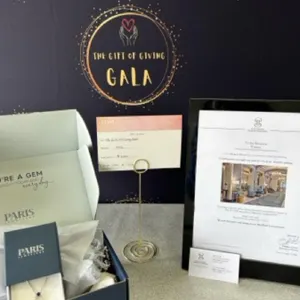 FOR HER - $1000 NWL Dress, Silver Blue Sapphire Pendant & 1-Night Stay at the Hotel Saskatchewan (NWL, The Hotel Saskatchewan & Paris Jewellers)
 UNR