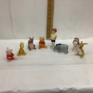 BESWICK (8) PIECE WINNIE THE POOH FIGURINES